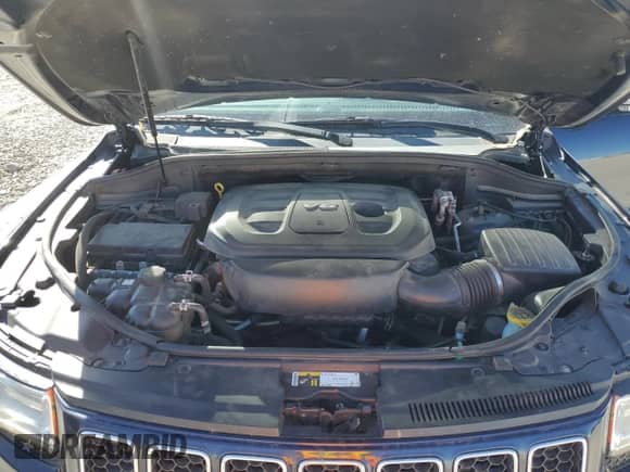 2016 Jeep Grand Cherokee Overland with VIN 1C4RJFCG2GC350920, listed as a Copart auction lot 80224945 with 141,409 mi miles and Salvage title. Bid and sale history available at DreamBid. Image 12.