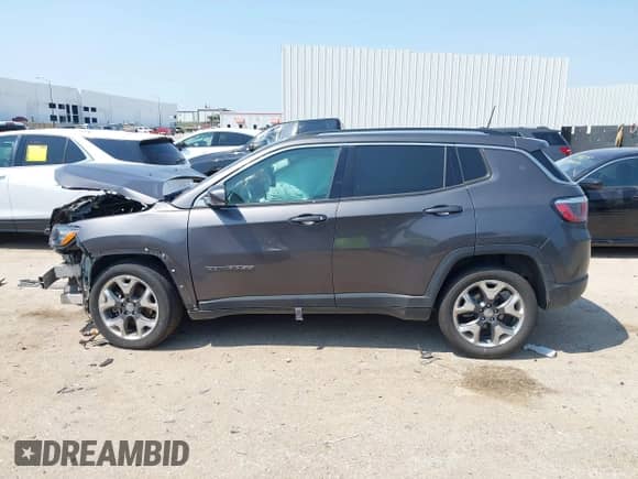 2020 Jeep Compass Limited with VIN 3C4NJCCB5LT114424, listed as a IAAI auction lot 43164924 with 99,096 mi miles and . Bid and sale history available at DreamBid. Image 14.