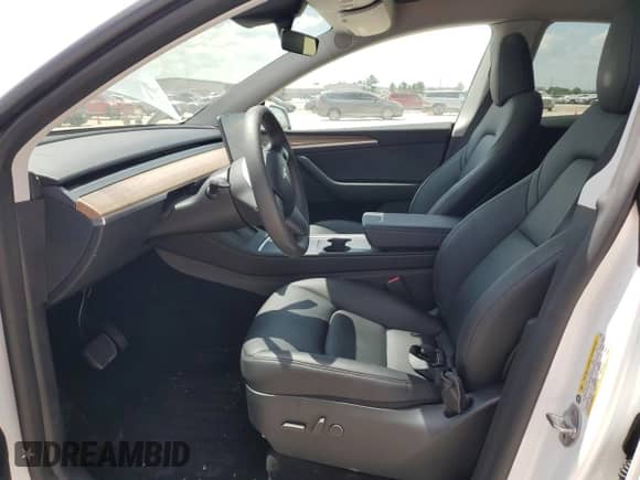 2023 Tesla Model Y Long Range с VIN 7SAYGDEE7PA112705, выставлен на аукционе Copart как лот 65862094 с пробегом 18 066 миль миль и Списание • Salvage title. История ставок и продаж доступна на DreamBid. Изображение 7.