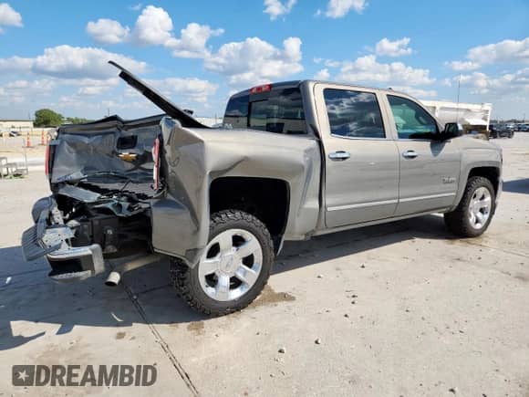 2017 Chevrolet Silverado 1500 LTZ with VIN 3GCPCSECXHG179093, listed as a Copart auction lot 84363995 with 153,438 mi miles and Salvage title. Bid and sale history available at DreamBid. Image 3.