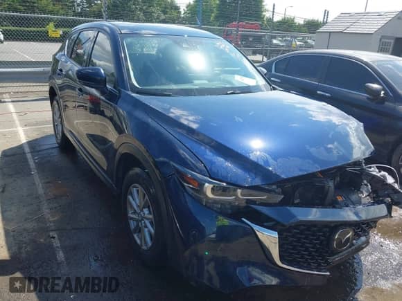2022 Mazda CX-5 S Select z VIN JM3KFBBM8N0625778, wystawiony jako IAAI lot #42547233 z przebiegiem 34 889 mil mil oraz . Historia ofert i sprzedaży dostępna na DreamBid. Obrazek 1.