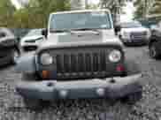 2012 Jeep Wrangler Sport z VIN 1C4AJWAG6CL228765, wystawiony jako Copart lot #80979855 z przebiegiem 216 434 mil mil oraz Szkoda całkowita • Salvage title. Historia ofert i sprzedaży dostępna na DreamBid. Obrazek 5.