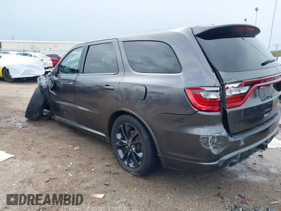 2021 Dodge Durango R/T with VIN 1C4SDHCT9MC804058, listed as a IAAI auction lot 41908193 with 106,395 mi miles and . Bid and sale history available at DreamBid. Image 3.