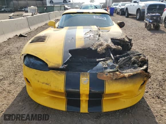 2002 Dodge Viper RT/10 z VIN 1B3ER65E42V101682, wystawiony jako Copart lot #69194365 z przebiegiem Nie podano mil oraz Szkoda całkowita • Salvage title. Historia ofert i sprzedaży dostępna na DreamBid. Obrazek 5.