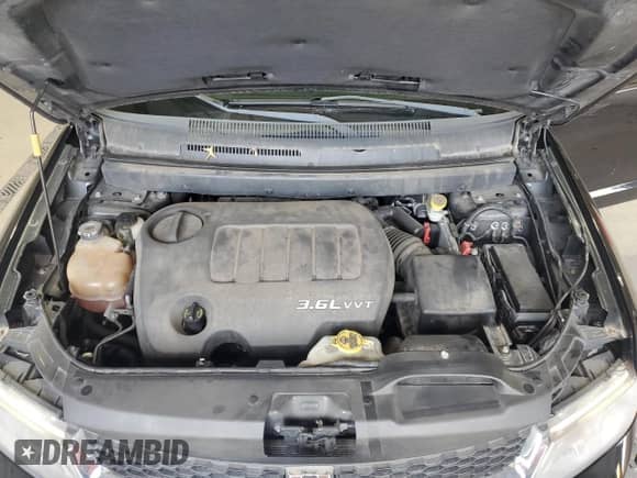 2013 Dodge Journey SXT with VIN 3C4PDCBGXDT716525, listed as a Copart auction lot 86057335 with 157,035 mi miles and Salvage title. Bid and sale history available at DreamBid. Image 12.