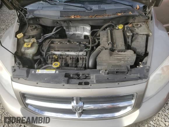 2008 Dodge Caliber SXT z VIN 1B3HB48B38D655284, wystawiony jako Copart lot #85874205 z przebiegiem 157 306 mil mil oraz Szkoda całkowita • Salvage title. Historia ofert i sprzedaży dostępna na DreamBid. Obrazek 11.