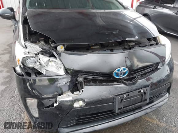 2015 Toyota Prius Two with VIN JTDKN3DU0F0470837, listed as a IAAI auction lot 43353303 with 128,704 mi miles and . Bid and sale history available at DreamBid. Image 6.