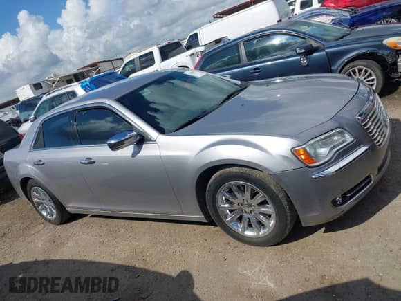 2014 Chrysler 300 C with VIN 2C3CCAETXEH109067, listed as a IAAI auction lot 42596910 with 150,337 mi miles and . Bid and sale history available at DreamBid. Image 13.