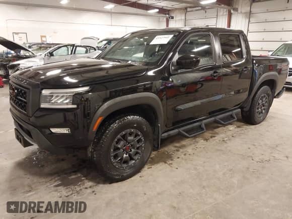 2023 Nissan Frontier Pro-4X z VIN 1N6ED1EKXPN616079, wystawiony jako IAAI lot #43327941 z przebiegiem 42 471 mil mil oraz . Historia ofert i sprzedaży dostępna na DreamBid. Obrazek 2.