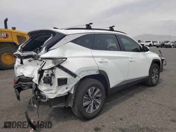 2024 Hyundai Tucson Blue with VIN KM8JBCD1XRU210836, listed as a Copart auction lot 70576955 with 13,043 mi miles and Salvage title. Bid and sale history available at DreamBid. Image 3.