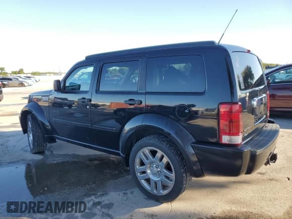 2007 Dodge Nitro R/T с VIN 1D8GU58617W721946, выставлен на аукционе Copart как лот 87194195 с пробегом 122 870 миль миль и Списание • Salvage title. История ставок и продаж доступна на DreamBid. Изображение 2.