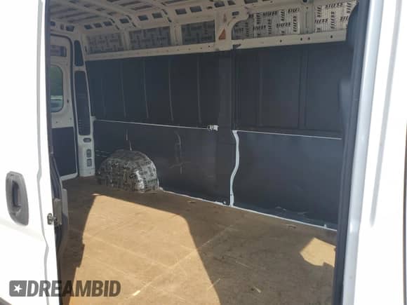 2021 Ram ProMaster Cargo с VIN 3C6LRVDG0ME530514, выставлен на аукционе Copart как лот 70582955 с пробегом 329 989 миль миль и Списание • Salvage title. История ставок и продаж доступна на DreamBid. Изображение 11.