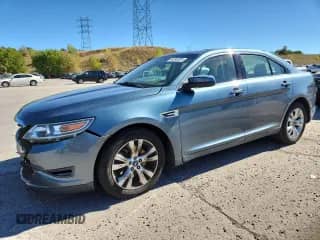 2010 Ford Taurus SEL with VIN 1FAHP2EWXAG118207, listed as a Copart auction lot 84240305 with 149,567 mi miles and Salvage title. Bid and sale history available at DreamBid. Image 1.