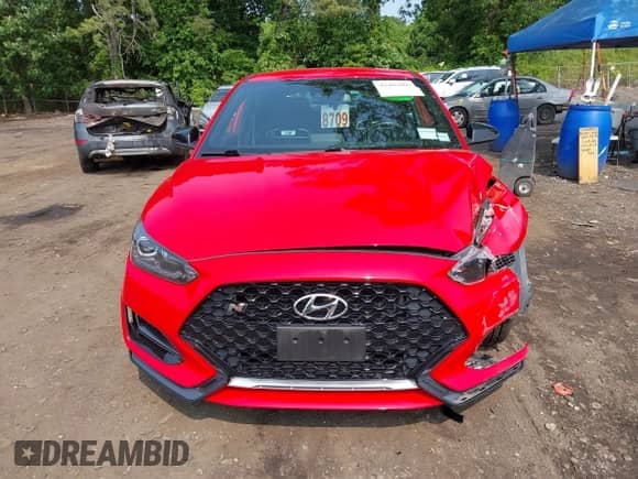 2022 Hyundai Veloster z VIN KMHT36AH5NU015388, wystawiony jako IAAI lot #42492097 z przebiegiem 31 757 mil mil oraz . Historia ofert i sprzedaży dostępna na DreamBid. Obrazek 12.