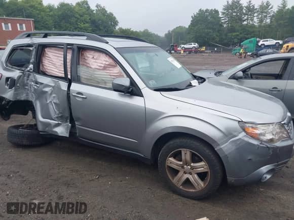 2009 Subaru Forester X with VIN JF2SH63659H759425, listed as a IAAI auction lot 39921368 with 216,092 mi miles and . Bid and sale history available at DreamBid. Image 13.