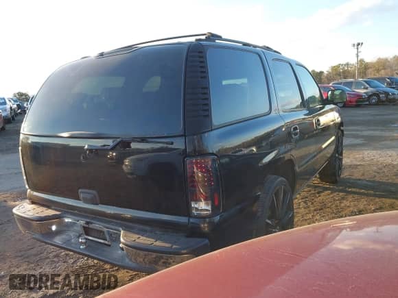 2001 Chevrolet Tahoe LS with VIN 1GNEC13T01J198722, listed as a IAAI auction lot 41385593 with Not provided miles and . Bid and sale history available at DreamBid. Image 4.