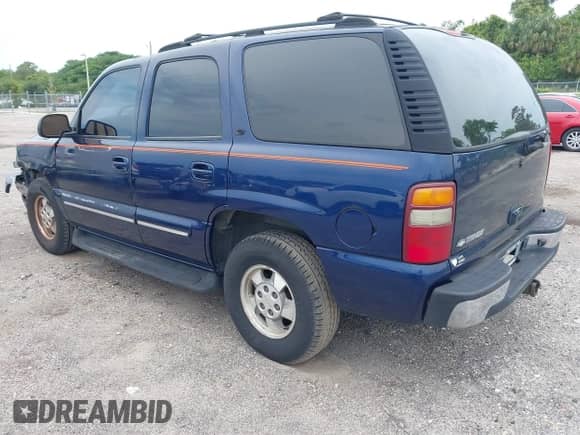 2002 Chevrolet Tahoe LS z VIN 1GNEC13Z62R217457, wystawiony jako IAAI lot #42408866 z przebiegiem 246 590 mil mil oraz . Historia ofert i sprzedaży dostępna na DreamBid. Obrazek 3.