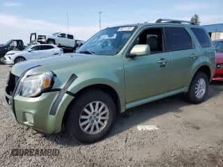 2009 Mercury Mariner Premier with VIN 4M2CU87719KJ11543, listed as a Copart auction lot 69211745 with 169,164 mi miles and Clean title. Bid and sale history available at DreamBid. Image 1.