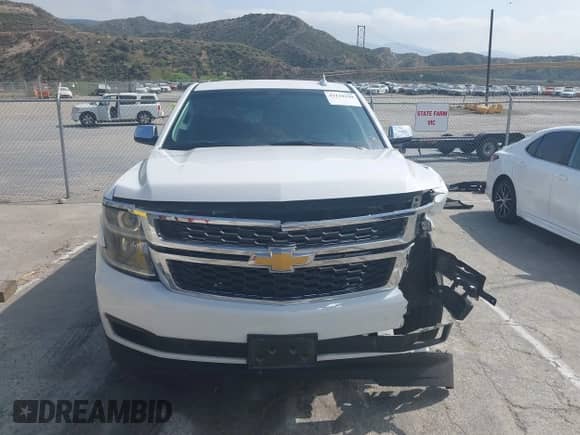 2015 Chevrolet Tahoe LS с VIN 1GNSCAEC7FR737717, выставлен на аукционе IAAI как лот 42110150 с пробегом 125 633 миль миль и . История ставок и продаж доступна на DreamBid. Изображение 12.