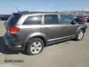2018 Dodge Journey SE with VIN 3C4PDCABXJT375709, listed as a Copart auction lot 85906354 with 104,489 mi miles and Non repairable. Bid and sale history available at DreamBid. Image 3.