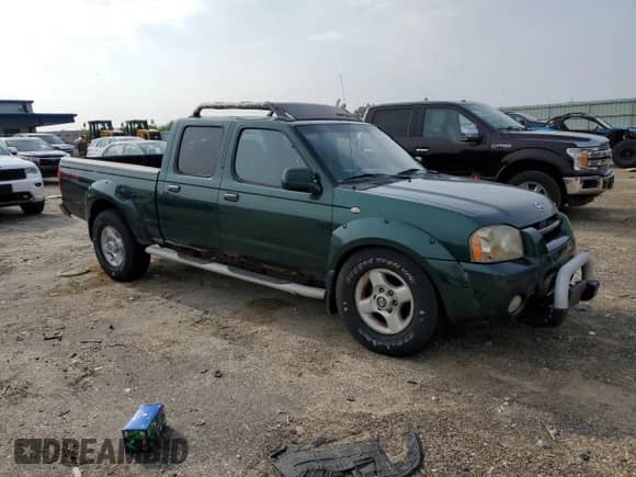 2002 Nissan Frontier XE with VIN 1N6ED29Y42C352222, listed as a Copart auction lot 60746075 with 200,798 mi miles and Clean title. Bid and sale history available at DreamBid. Image 4.