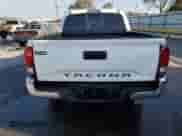 2020 Toyota Tacoma SR with VIN 5TFAX5GN3LX165499, listed as a Copart auction lot 84973885 with 67,043 mi miles and Salvage title. Bid and sale history available at DreamBid. Image 6.