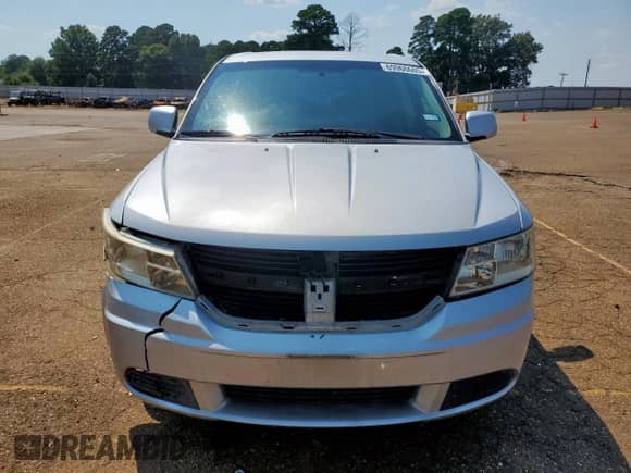 2009 Dodge Journey SXT with VIN 3D4GG57V99T568050, listed as a Copart auction lot 69966605 with 174,837 mi miles and Salvage title. Bid and sale history available at DreamBid. Image 5.