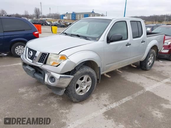2007 Nissan Frontier LE with VIN 1N6AD07W17C451883, listed as a IAAI auction lot 41498795 with 216,207 mi miles and . Bid and sale history available at DreamBid. Image 2.