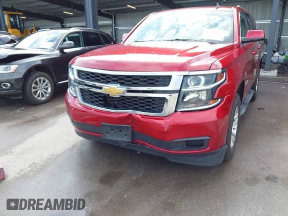2015 Chevrolet Tahoe LT z VIN 1GNSKBKC9FR126438, wystawiony jako IAAI lot #43276273 z przebiegiem 92 503 mil mil oraz . Historia ofert i sprzedaży dostępna na DreamBid. Obrazek 6.