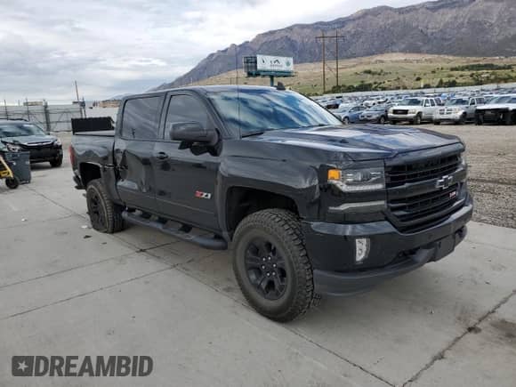 2017 Chevrolet Silverado 1500 LTZ with VIN 3GCUKSEJ0HG357386, listed as a Copart auction lot 82530165 with 82,649 mi miles and Salvage title. Bid and sale history available at DreamBid. Image 4.