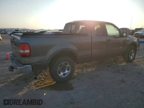 2004 Ford F-150 XL with VIN 1FTPX12504NA52326, listed as a Copart auction lot 82743415 with 254,627 mi miles and Clean title. Bid and sale history available at DreamBid. Image 3.