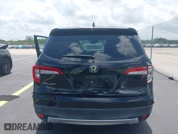 2020 Honda Pilot EX-L with VIN 5FNYF5H59LB006867, listed as a IAAI auction lot 42537418 with 57,725 mi miles and . Bid and sale history available at DreamBid. Image 17.