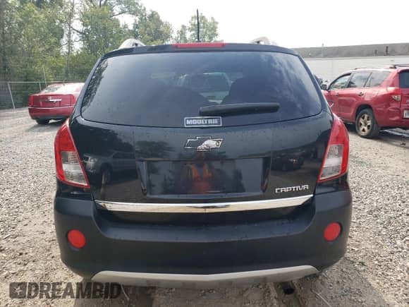 2014 Chevrolet Captiva Sport LS with VIN 3GNAL2EK0ES586675, listed as a Copart auction lot 70558614 with 163,616 mi miles and Salvage title. Bid and sale history available at DreamBid. Image 6.