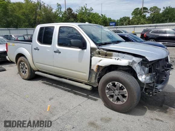 2017 Nissan Frontier Desert Runner with VIN 1N6DD0ER5HN704719, listed as a Copart auction lot 58788555 with 152,557 mi miles and Salvage title. Bid and sale history available at DreamBid. Image 4.