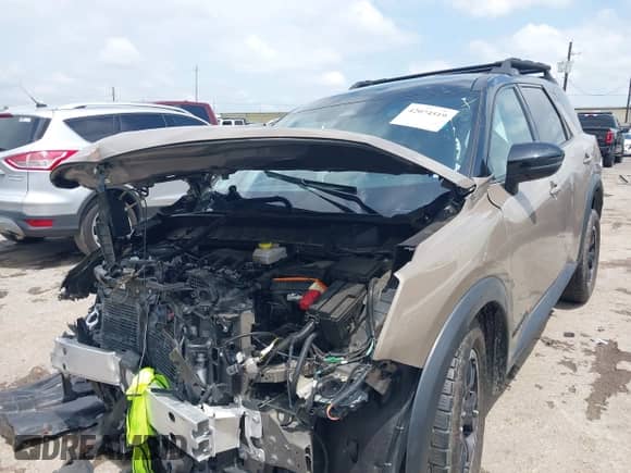 2023 Nissan Pathfinder Rock Creek with VIN 5N1DR3BD9PC228981, listed as a IAAI auction lot 42074519 with 34,763 mi miles and . Bid and sale history available at DreamBid. Image 2.