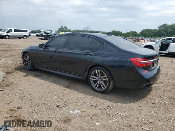 2016 BMW 7 Series 750i xDrive with VIN WBA7F2C5XGG417558, listed as a Copart auction lot 65567865 with 94,441 mi miles and Salvage title. Bid and sale history available at DreamBid. Image 2.