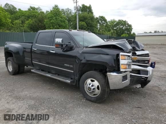 2019 Chevrolet Silverado 3500HD LTZ with VIN 1GC4KXCY5KF235175, listed as a Copart auction lot 54929465 with 184,720 mi miles and Salvage title. Bid and sale history available at DreamBid. Image 4.