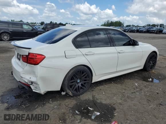2015 BMW 3 Series 335i xDrive with VIN WBA3B9C51FP982847, listed as a Copart auction lot 63790055 with 141,778 mi miles and Salvage title. Bid and sale history available at DreamBid. Image 3.