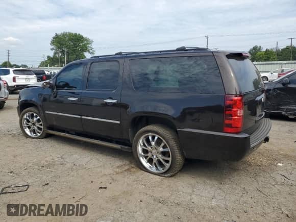 2012 Chevrolet Suburban LTZ z VIN 1GNSCKE00CR223070, wystawiony jako Copart lot #65436745 z przebiegiem Nie podano mil oraz Szkoda całkowita • Salvage title. Historia ofert i sprzedaży dostępna na DreamBid. Obrazek 2.