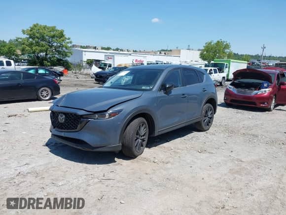 2025 Mazda CX-5 S Carbon Edition z VIN JM3KFBCM9S0639523, wystawiony jako IAAI lot #42391356 z przebiegiem 4 936 mil mil oraz . Historia ofert i sprzedaży dostępna na DreamBid. Obrazek 18.