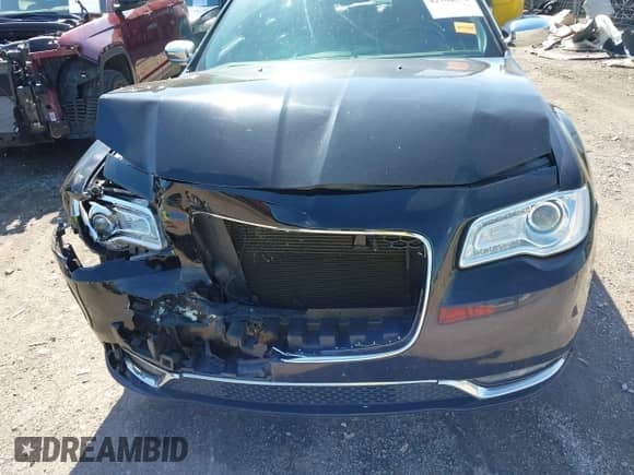 2016 Chrysler 300 C z VIN 2C3CCAEG0GH167422, wystawiony jako IAAI lot #42162970 z przebiegiem 143 073 mil mil oraz . Historia ofert i sprzedaży dostępna na DreamBid. Obrazek 13.