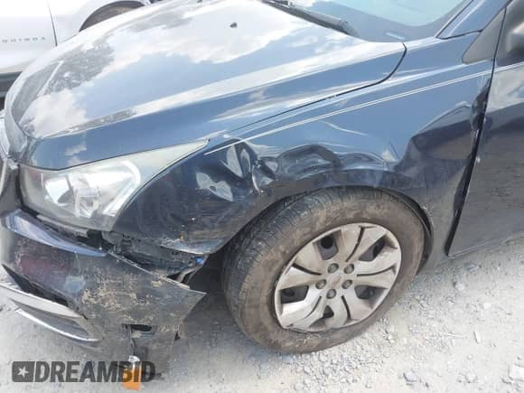 2015 Chevrolet Cruze LS z VIN 1G1PA5SH2F7170364, wystawiony jako IAAI lot #42582370 z przebiegiem 148 842 mil mil oraz . Historia ofert i sprzedaży dostępna na DreamBid. Obrazek 6.