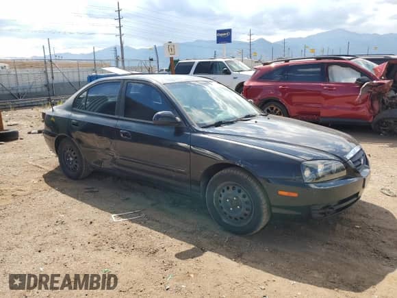 2005 Hyundai Elantra GLS z VIN KMHDN46D45U021031, wystawiony jako Copart lot #70877694 z przebiegiem 184 824 mil mil oraz Szkoda całkowita • Salvage title. Historia ofert i sprzedaży dostępna na DreamBid. Obrazek 4.