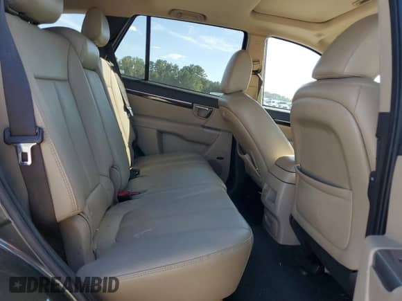 2012 Hyundai Santa Fe Limited с VIN 5XYZKDAG0CG126815, выставлен на аукционе Copart как лот 71302305 с пробегом 210 716 миль миль и Списание • Salvage title. История ставок и продаж доступна на DreamBid. Изображение 11.