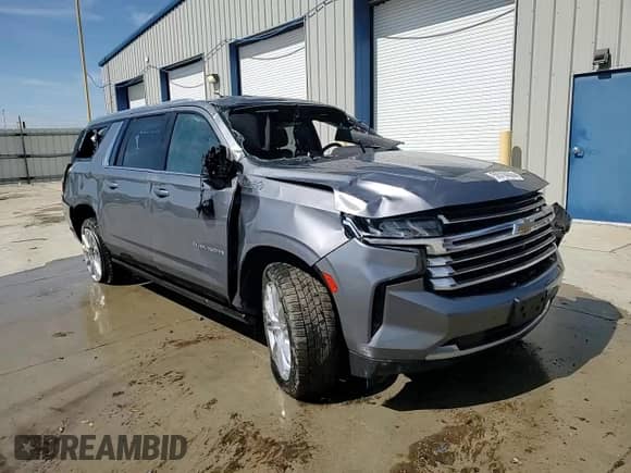2022 Chevrolet Suburban High Country with VIN 1GNSKGKLXNR212370, listed as a Copart auction lot 50708835 with 114,646 mi miles and Salvage title. Bid and sale history available at DreamBid. Image 15.