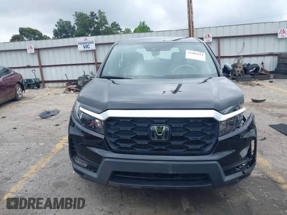 2023 Honda Passport EX-L with VIN 5FNYF8H56PB009779, listed as a IAAI auction lot 42502614 with 35,809 mi miles and . Bid and sale history available at DreamBid. Image 12.