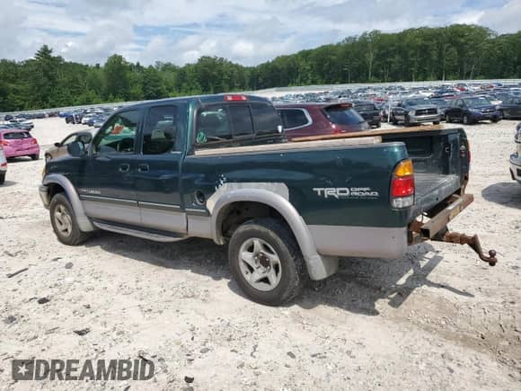 2001 Toyota Tundra Limited z VIN 5TBBT48101S167986, wystawiony jako Copart lot #64989255 z przebiegiem 217 919 mil mil oraz Czysty tytuł • Clean title. Historia ofert i sprzedaży dostępna na DreamBid. Obrazek 2.