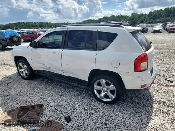 2012 Jeep Compass Limited с VIN 1C4NJCCB9CD548383, выставлен на аукционе Copart как лот 64979365 с пробегом 238 825 миль миль и Списание • Salvage title. История ставок и продаж доступна на DreamBid. Изображение 2.