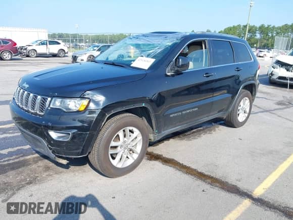 2018 Jeep Grand Cherokee Altitude with VIN 1C4RJEAGXJC247040, listed as a IAAI auction lot 42928303 with 84,955 mi miles and . Bid and sale history available at DreamBid. Image 2.