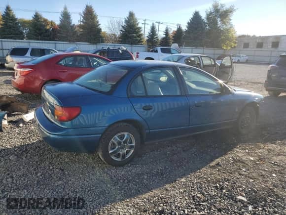 2002 Saturn SL with VIN 1G8ZF52882Z206326, listed as a Copart auction lot 77197844 with 105,810 mi miles and Salvage title. Bid and sale history available at DreamBid. Image 3.